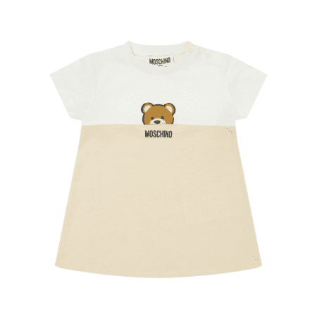 Moschino Kids baby girls' organic cotton t-shirt dress featuring a white/cream upper and beige lower section, crew neck with shoulder snaps, short sleeves, and a Moschino Teddy Bear print on the chest, presented with a gift box, available at Lestyle Boutique 136 Little Collins St.