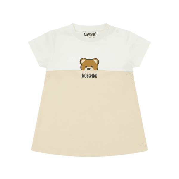 Moschino Kids baby girls organic cotton t shirt dress featuring a whitecream upper and beige lower section crew neck with shoulder snaps short sleeves and a Moschino Teddy Bear print on the chest presented with a gift box available at Lestyle Boutique 136 Little Collins St