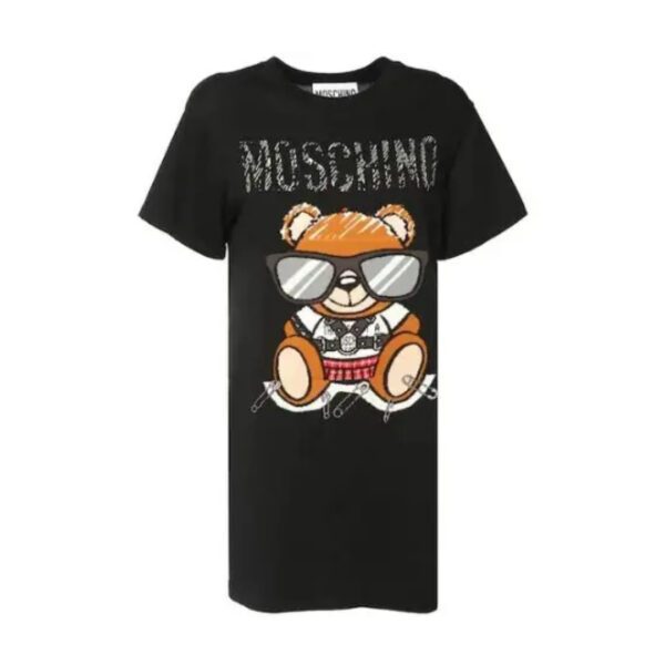 Moschino black t shirt dress featuring a crew neck short sleeves and a large Moschino Teddy Bear print with safety pin details and textured logo on the chest available at Lestyle Boutique 136 Little Collins St